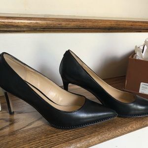 Coach pumps with 3 inch heels.